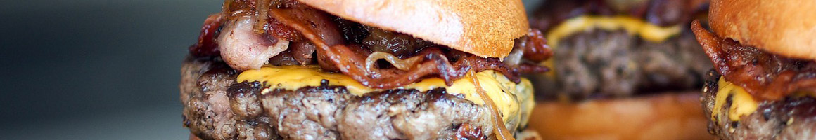 Eating American (New) Burger at Freddy's Frozen Custard & Steakburgers restaurant in Lubbock, TX.